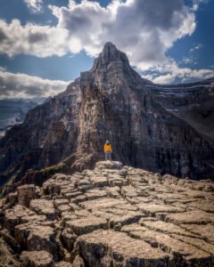 Landscape Photographer Annette Stiers Jones standing at the top of Devil's Thumb, Banff National Park