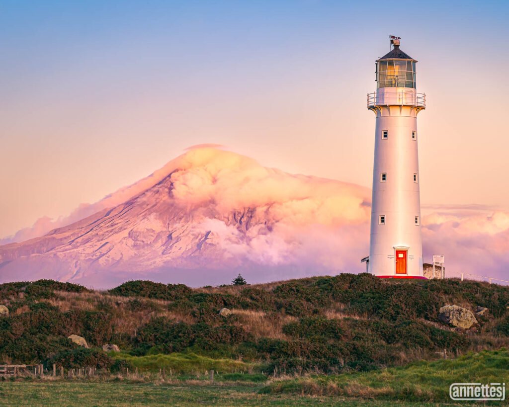 Sunset on Cape Egmont Lighthouse and Mount Taranaki, New Zealand