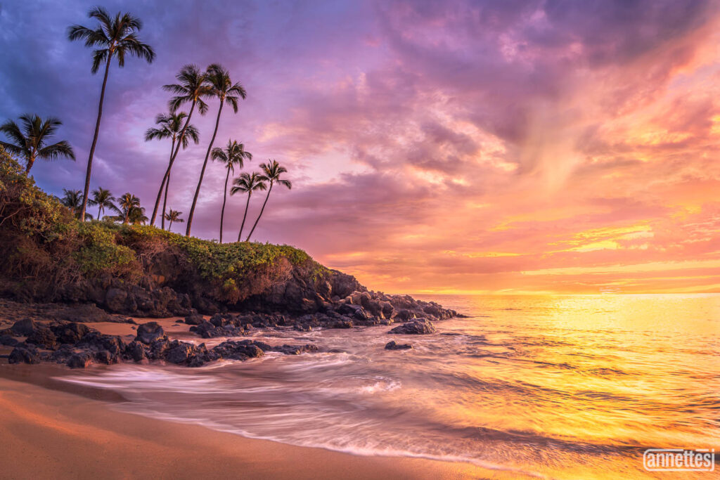 A beautiful sunset on a beach in Maui, Hawaii